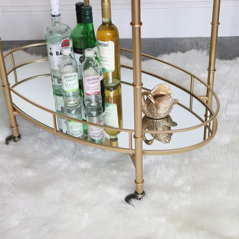 Golden Glamour Oval Drinks Trolley with Mirrored Elegance