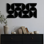 Artistic Wall Decor with Black Cutout Geometric Forms