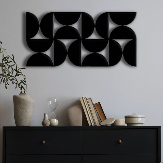 Artistic Wall Decor with Black Cutout Geometric Forms
