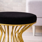 black-velvet-pouffe-with-glamorous-gold-detailing