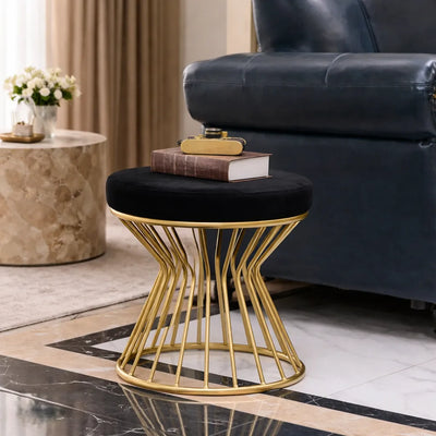 black-velvet-pouffe-with-glamorous-gold-detailing
