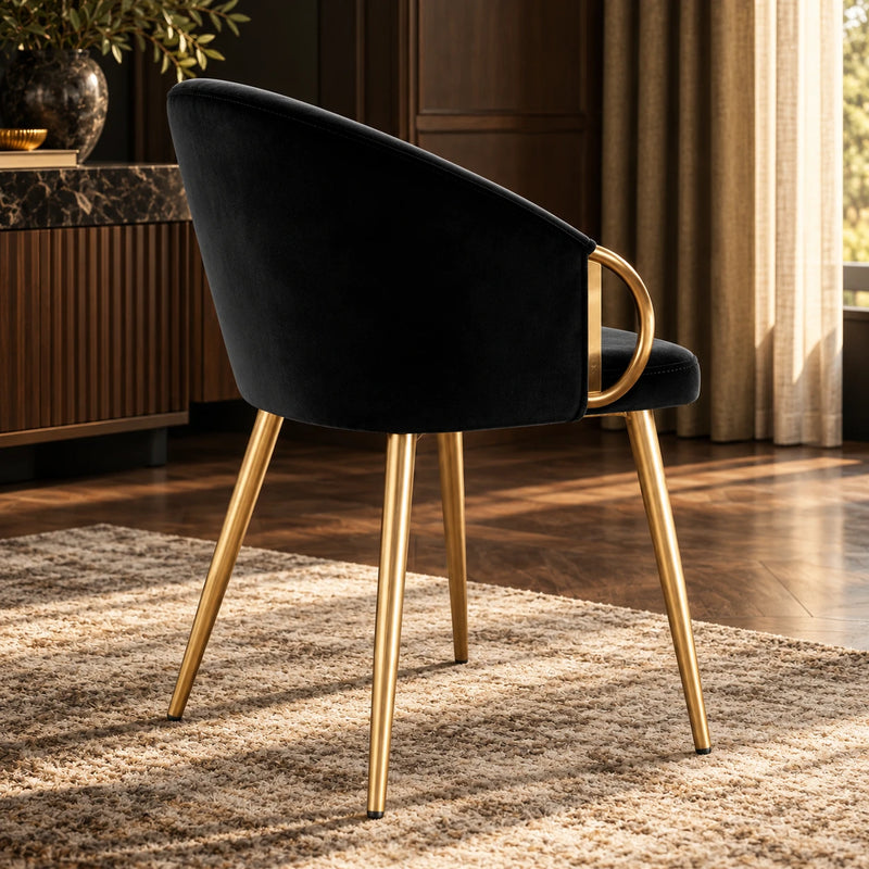Elegant Black Accent Armchair with Rounded Back & Golden Legs