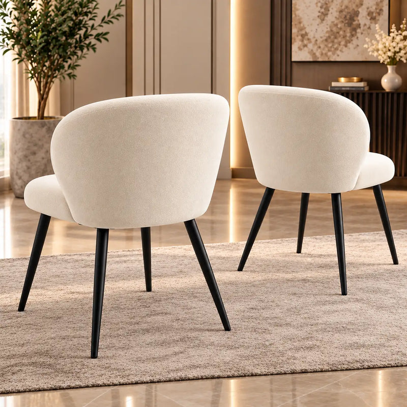 Elegant Cream Upholstered Accent Chair with Curved Backrest & Black Metal Legs