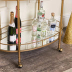 Golden Glamour Oval Drinks Trolley with Mirrored Elegance