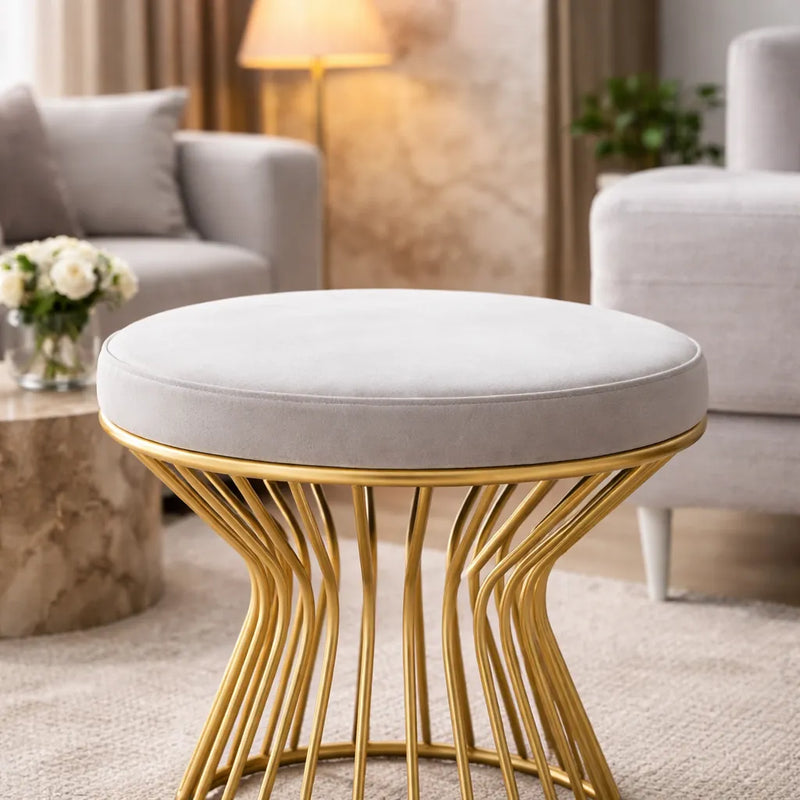 premium-white-velvet-pouffe-with-glamorous-gold-detailing