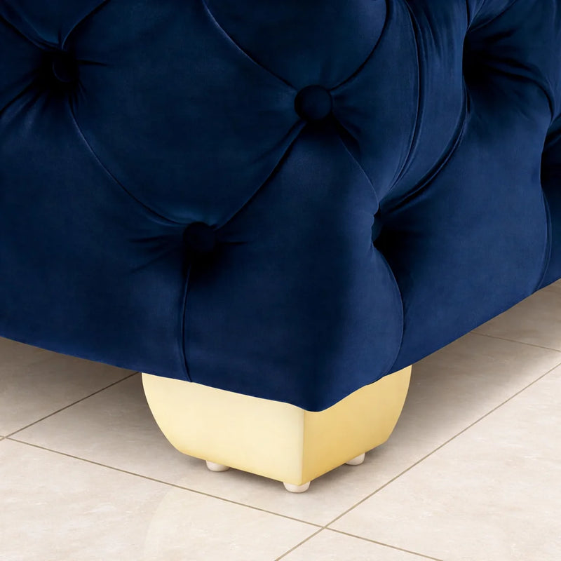 square-shaped-royal-blue-velvet-ottoman-with-golden-metal-finish