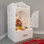 White Wooden Floor Pooja Mandir with Laser-Cut Lotus & Bell Doors Shubh Labh Design Hanging Diya Motifs & Storage Cabinet