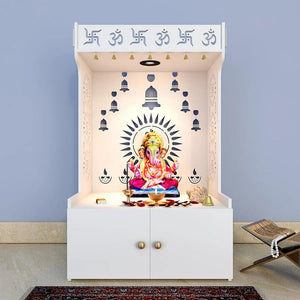 White Wooden Floor Pooja Mandir with Om & Swastik Design Ganesh Laser-Cut Back Panel Bell Motifs & Storage Cabinet